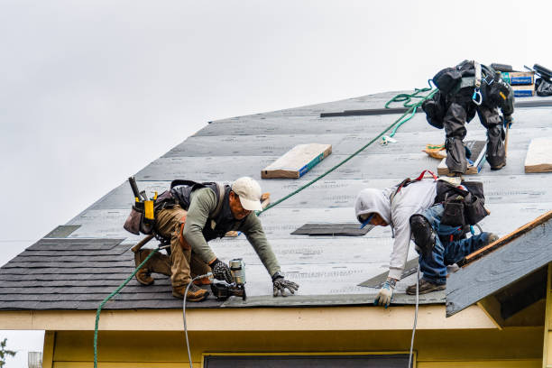 Professional Gutter Installation technician working in Merrimack, NH